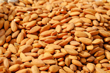 Organic almond background texture, close-up