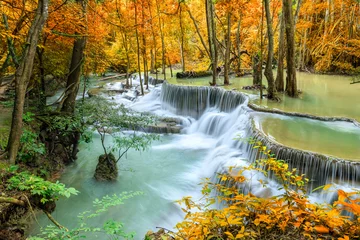 Keuken foto achterwand Pistache Colorful majestic waterfall in national park forest during autumn - Image