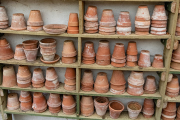 shelves of old clay pots
