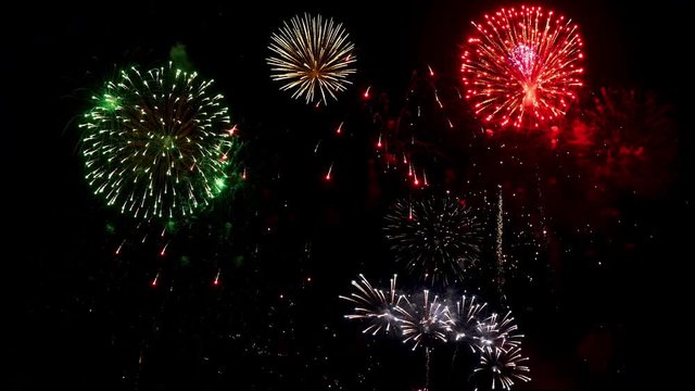 Mix amazing firework show for celebration on black sky at night. (4K Video)