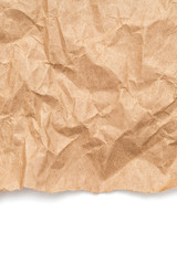Brown crumpled wrapping paper with torn border