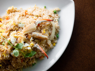 Crab fried rice served in a Thai restaurant. Delicious and authentic food from Thailand.