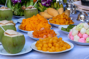 Sacrificial offering food for pray to god and memorial to ancestor, Bangkok, Thailand. Traditional offerings to gods with food, vegetable and fruit for the gods of Thai culture