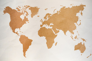 Vintage world map on an old fabric texture for textured backgrounds.