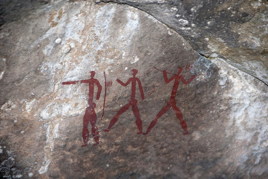 San bushman rock painting of three figures