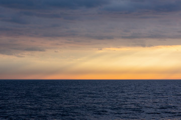 sunset rain over the lake