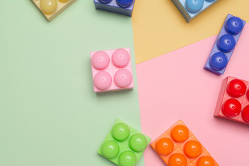 Colored toy bricks background. Plastic toy for children. Education concept .