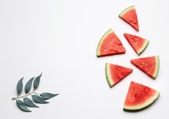 Slices of watermelon on a white background. Top view. Copy space.