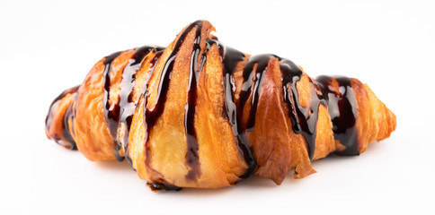 hot croissant with chocolate on white background