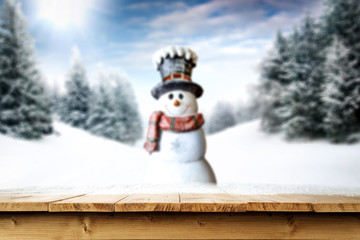 Snowy glittering winter landscape with space for products and decorations. Happy Christmas time.