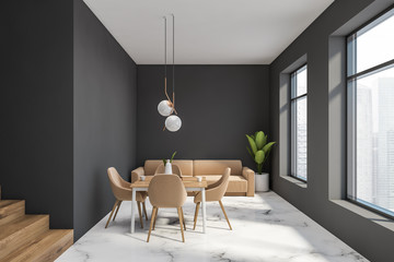 Gray dining room with beige sofa