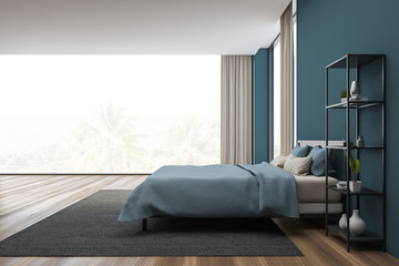 Side view of panoramic blue bedroom