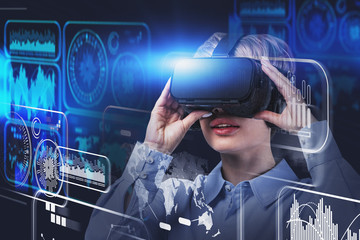 Fototapeta na wymiar Woman in VR glasses, digital interface