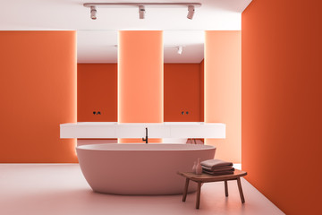 Orange bathroom interior, tub and double sink