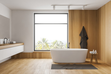 Fototapeta na wymiar Stylish white and wood bathroom interior