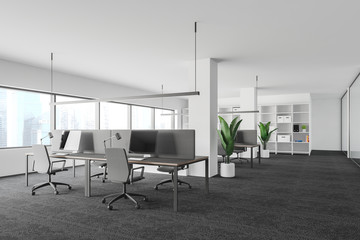 White open space office corner with window