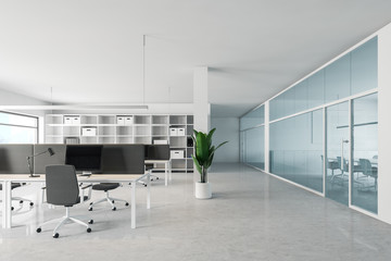 White open space office with meeting room