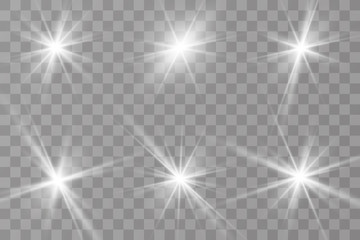 Obraz premium Set of bright beautiful stars. Light effect. Bright Star. Beautiful light to illustrate. Christmas star. White glitter sparkles with special light effect. Vector sparkles on a transparent background.