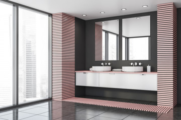 Double sink in gray and pink bathroom corner