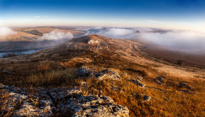 Morning fog on the banks of the Dniester River. Landscapes of Ukraine.