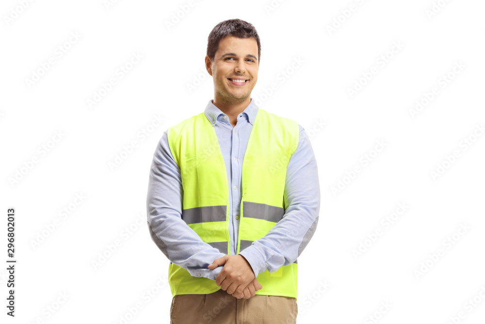 Poster full length portrait of young man with arms crossed and safety vest