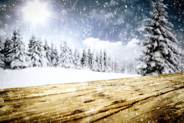 Snowy glittering winter landscape with space for products and decorations. Happy Christmas time.