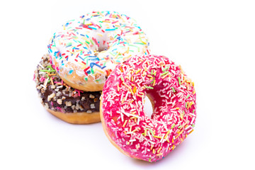 Delicious sweet donuts on white background