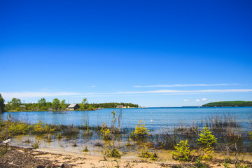 landscape with lake and blue sky