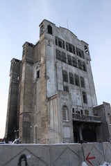 Fototapeta na wymiar Old abandoned flour mill building Russia