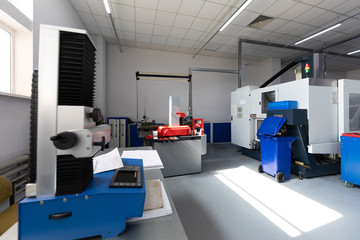 Inside of factory unit with new modern computerized equipment