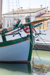 Historic sailing boats in the port of Cesenatico Italy