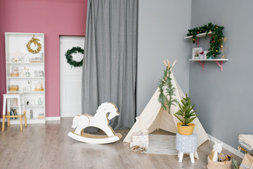 Children's room, decorated for Christmas or New Year in pink and gray