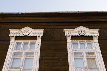 Carved wooden Windows in a wooden house