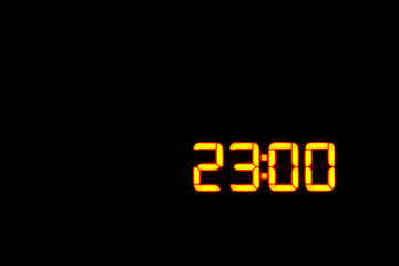Time to sleep. night. exact evening time. 23:00 on the electronic clock display. 11:00 pm Time relax. copy space