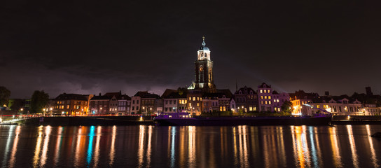 Fototapeta na wymiar Panorama of the skyline of the city of Deventer, Netherlands at night