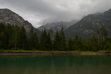 Lake in the mountains with fog