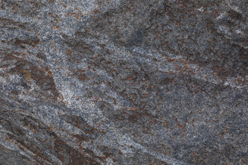 Elevated view of grey rugged granite stone surface