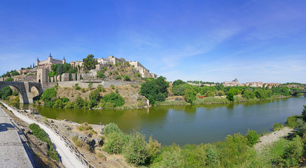 Fototapeta na wymiar Panoramic view of the former Imperial City of Toledo, a UNESCO World Heritage site located on the Tagus River in Castile La Mancha, Spain