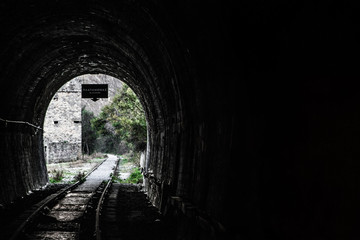 Fototapeta na wymiar Old train tracks in a tunnel