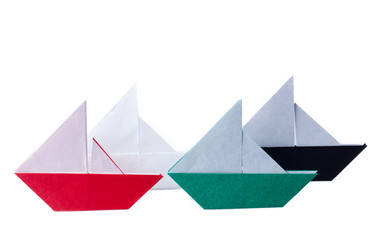 Paper boats arranged like UAE flag and  national day spirit of union