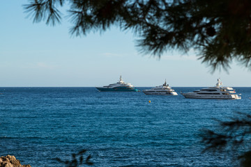 Obraz premium View of luxury yachts in the sea, Menton, France. Close-up.