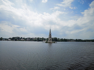Fototapeta na wymiar Volga river cruise bell tower of a flooded church