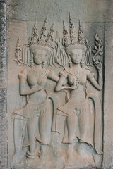 details of Apsara nymphs  bas-reliefs on a  wall, angkor wat