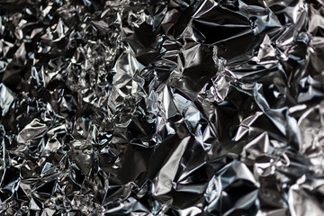 Full frame take of a sheeT of crumpled silver aluminum foil