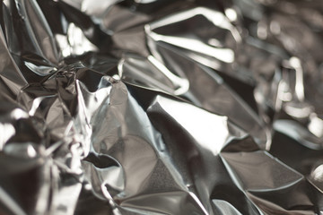 Full frame take of a sheeT of crumpled silver aluminum foil
