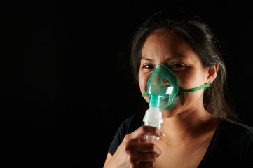 Portrait of young woman with medical mask