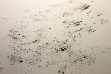 This is a photograph of a background created by applying Black marks onto a White paper using crayons