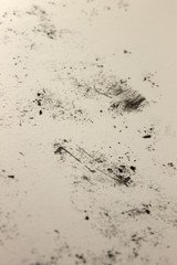 This is a photograph of a background created by applying Black marks onto a White paper using crayons