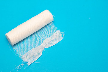 White bandage on a blue background closeup