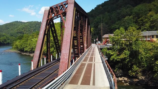 Motion across the New River Gorge towards the abandoned town of Thurmond West Virginia owned and operated by the US National Park Service.